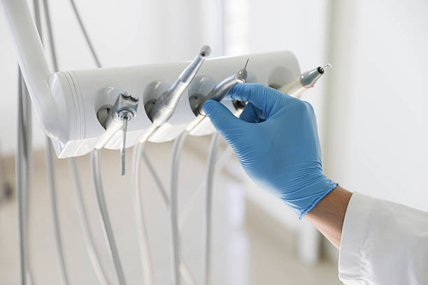 Professional Tooth Extraction technician working in Creston, IA